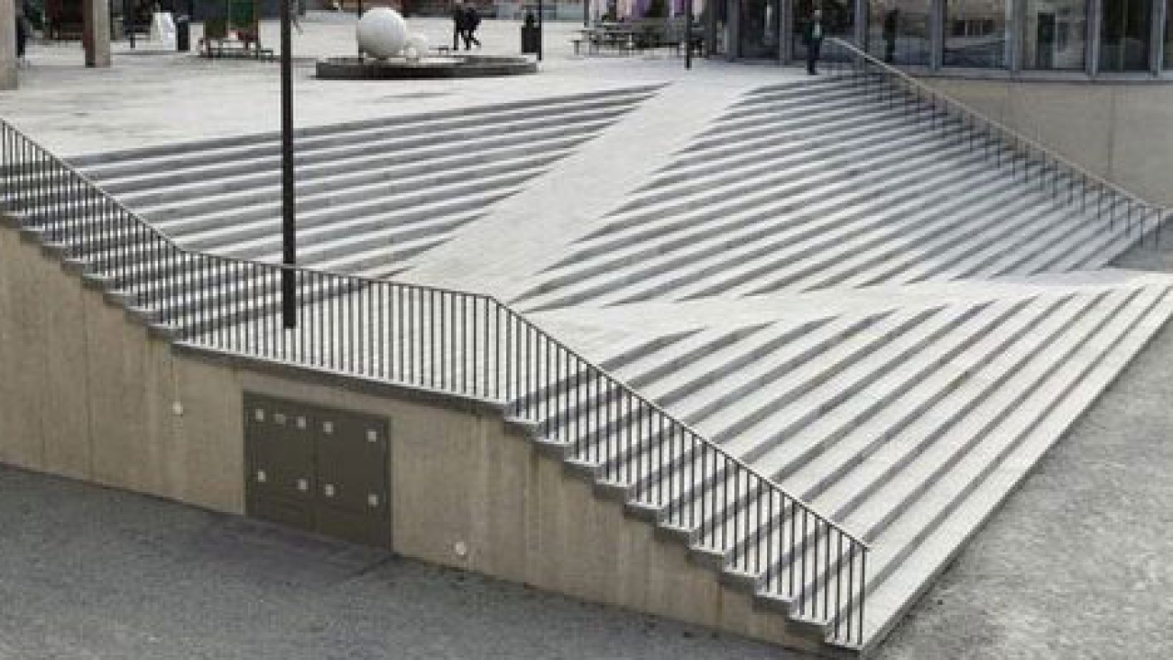Image of stairs leading to a paved area