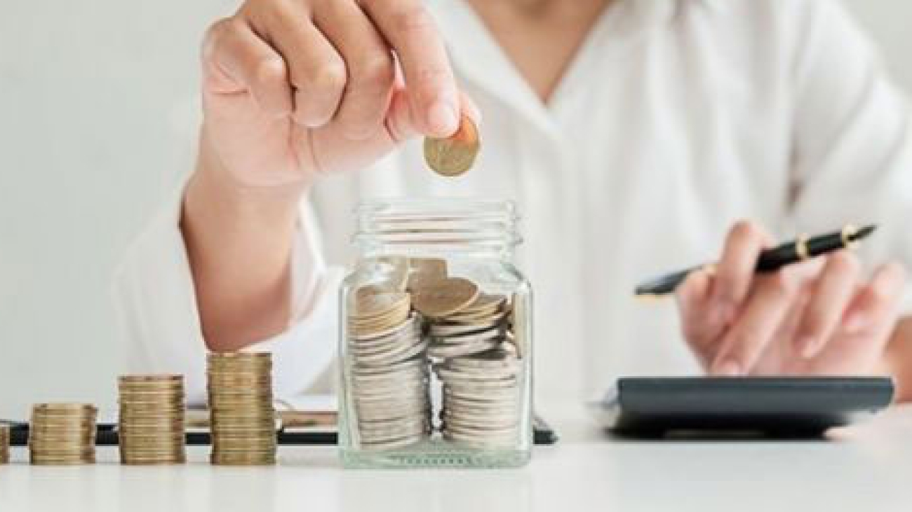 A woman counting coins