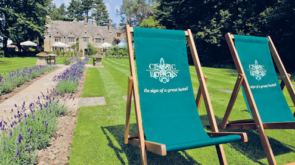 Green deck chairs outside Charingworth
