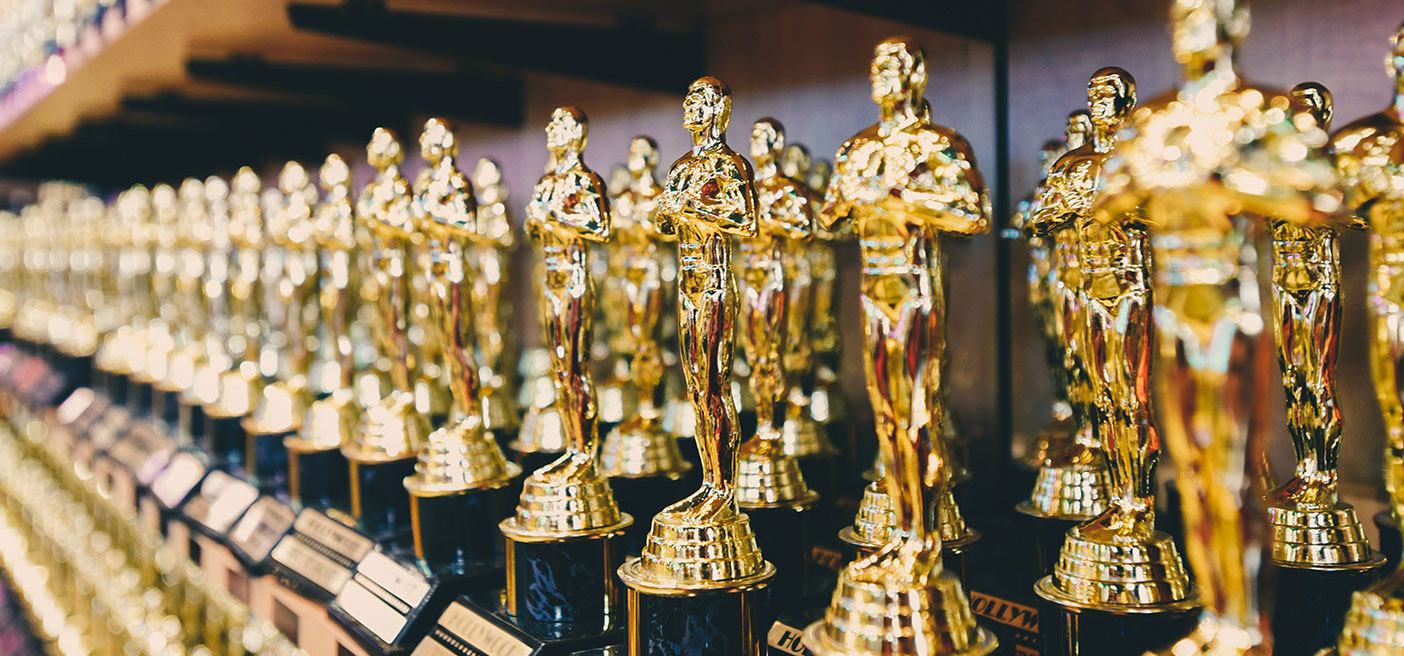 Awards lined up at an awards ceremony