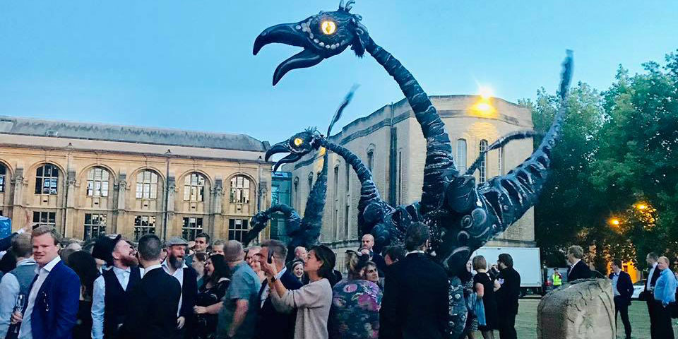 Some of the Norwegian group next to a sculpture