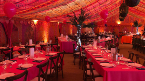 Event Marquee decorated with reds and oranges