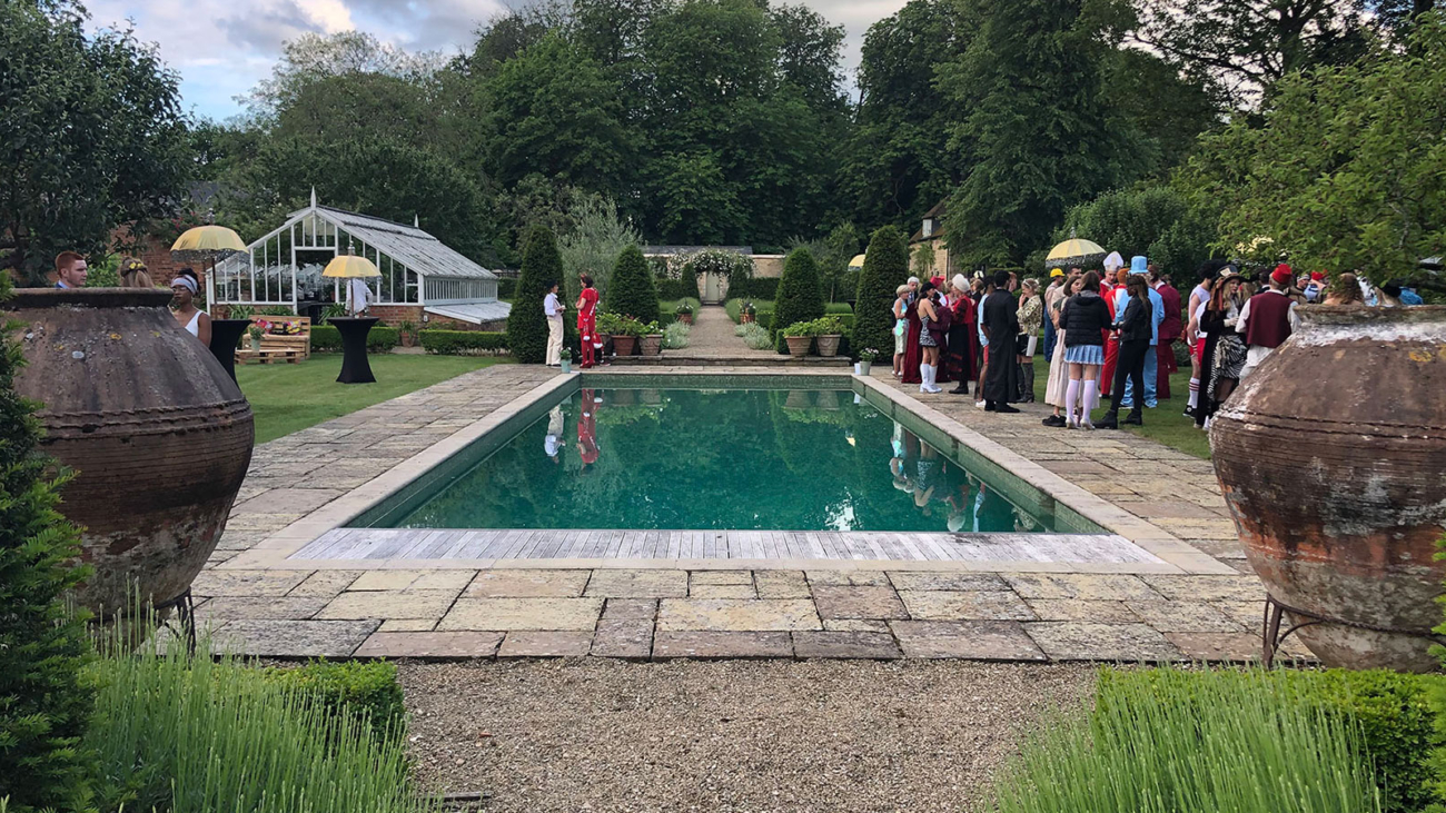 Event outside next to an outdoor pool