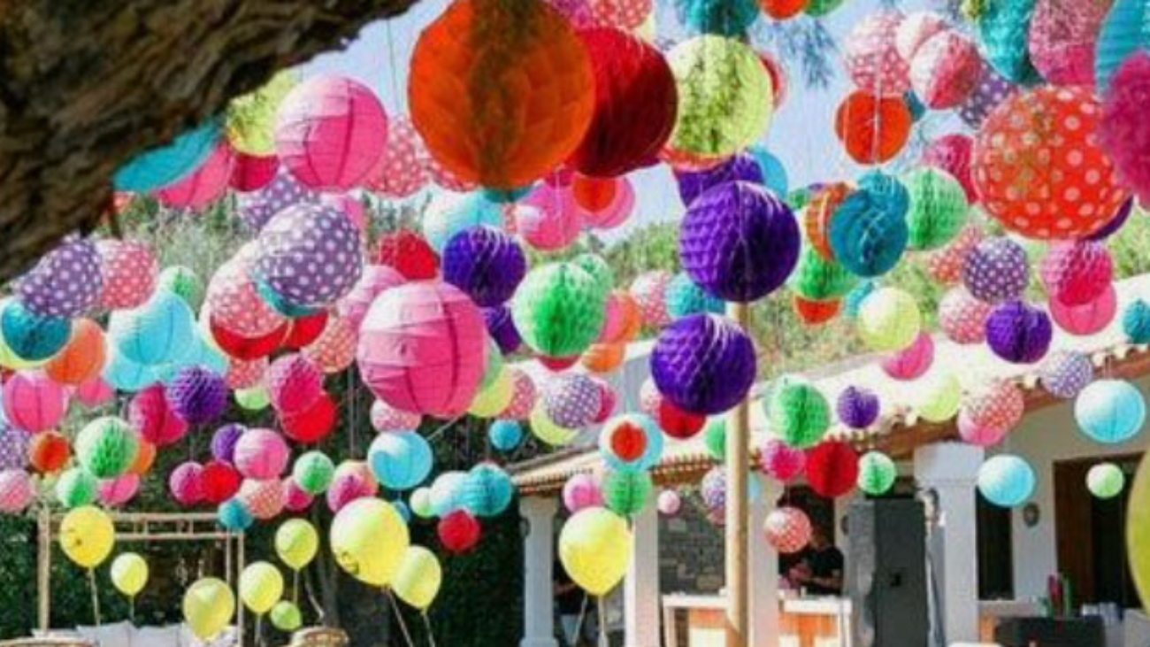 Coloured lanterns hanging from a tree
