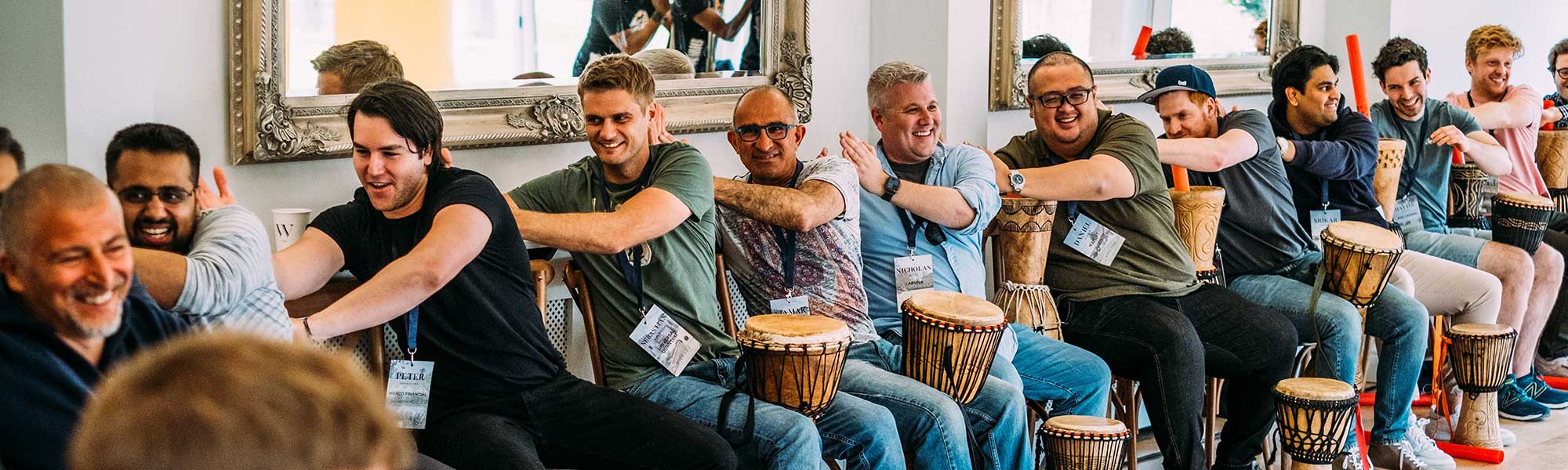 A company team building event with bongo drums